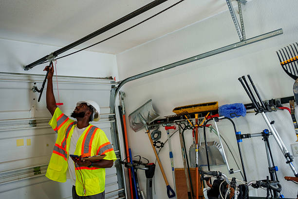 Professional Garage Door Panel Replacement technician working in McLean County County, ND